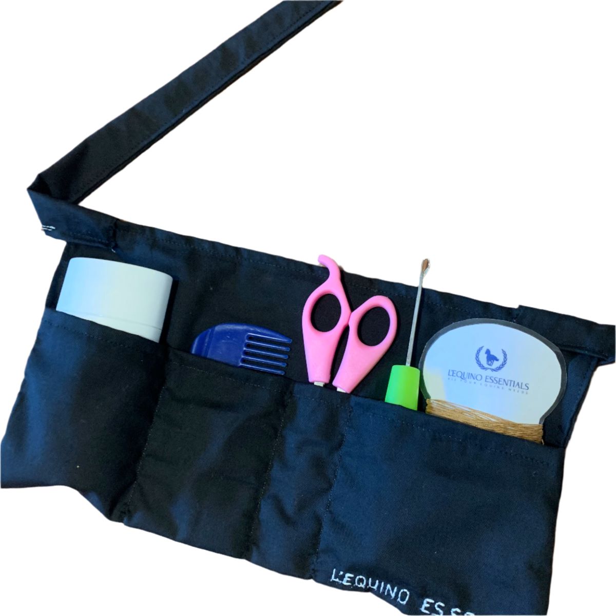 Black apron with various tools and a container on a white background