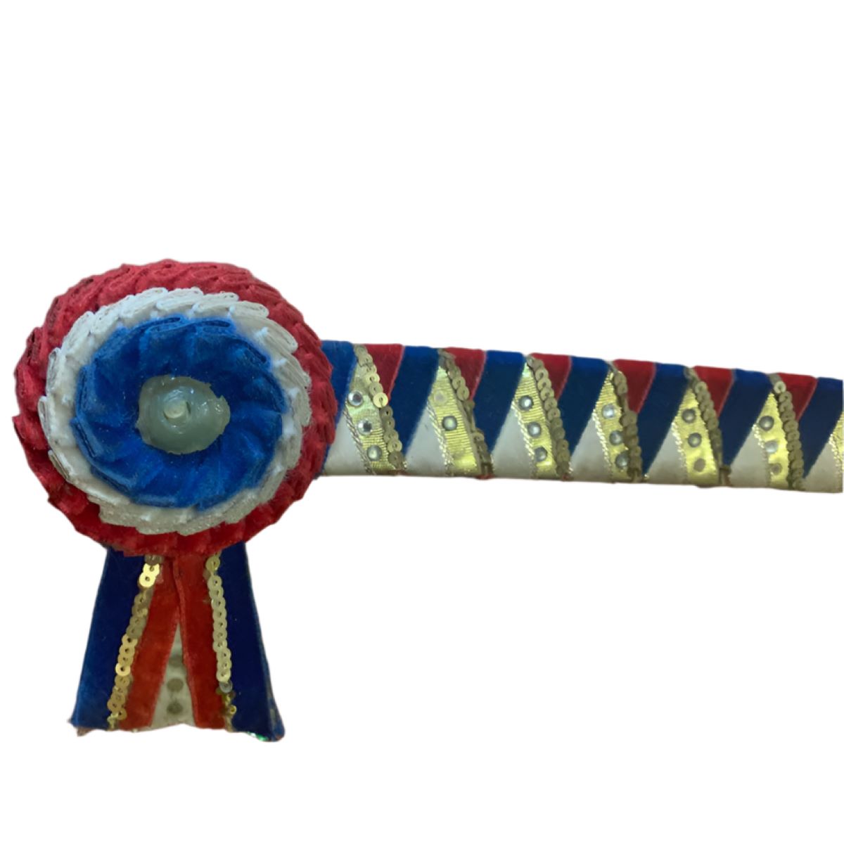 Decorative browband with blue, red, and gold colors on a white background before repair