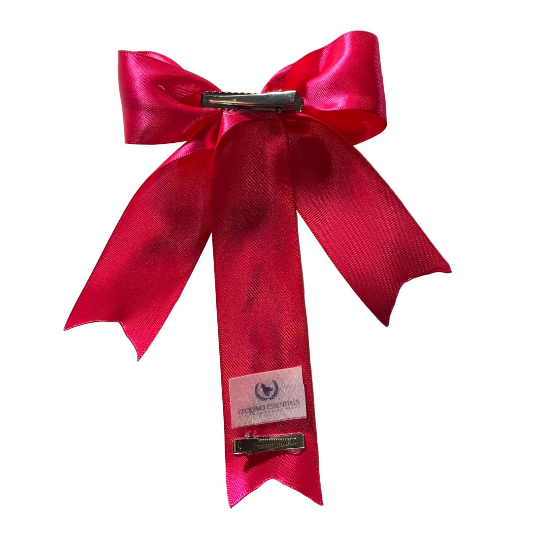Pink satin tail bow with a brand label on a white background