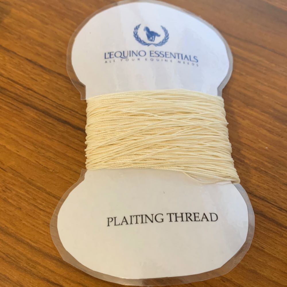 Spool of plaiting thread on a branded stand with 'L'Equino Essentials' logo.