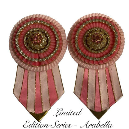 Two decorative rosettes with pink and gold design on a white background, labeled 'Limited Edition Series - Arabella'.