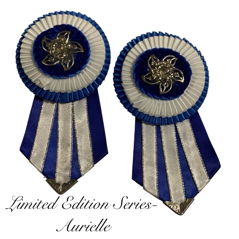Two blue and white rosettes with decorative elements on a white background, labeled 'Limited Edition Series Aurielle'.
