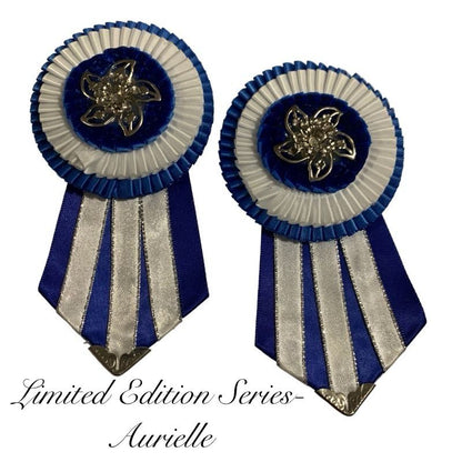 Two blue and white rosettes with decorative elements on a white background, labeled 'Limited Edition Series Aurielle'.