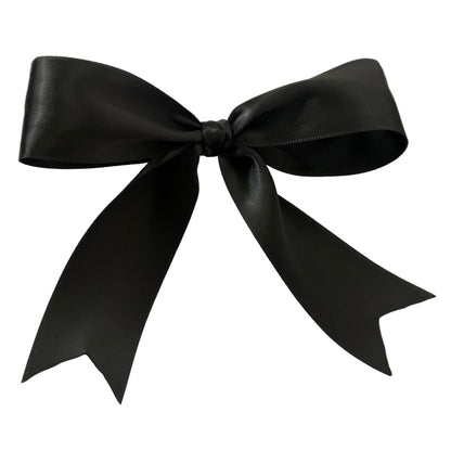Black hair bow on a white background