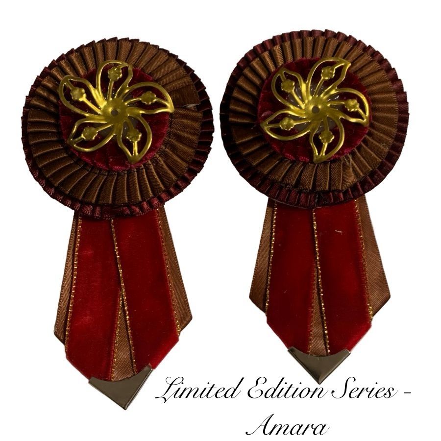 Two decorative removable rosettes with gold center and red and brown tail on a white background, labeled 'Limited Edition Series Amara'.