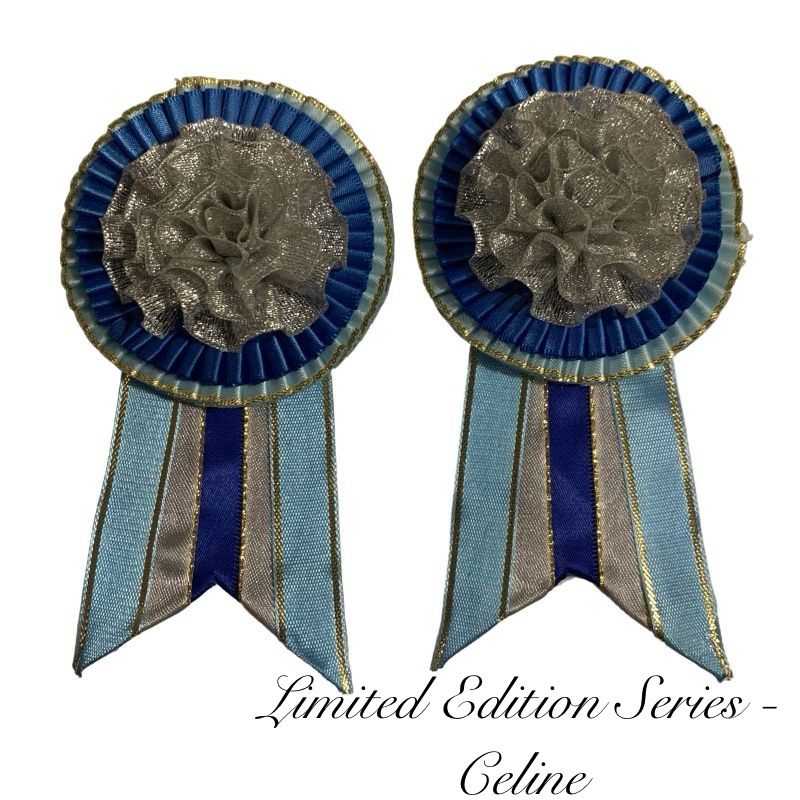 Blue and silver removable rosettes on a white background, featuring the name 'Celine'.