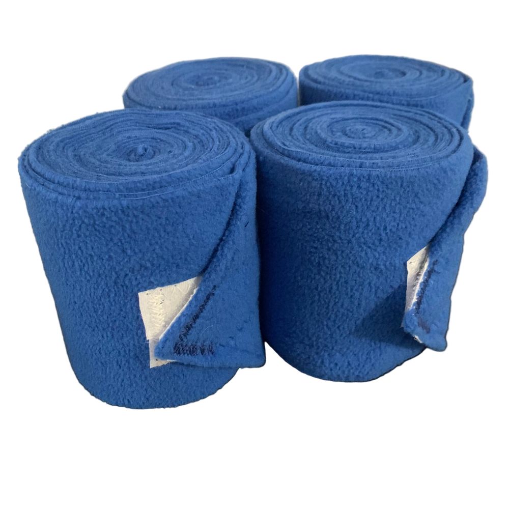 Four rolls of blue polo wraps on a white background