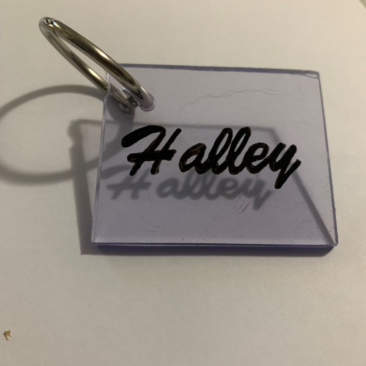 Clear keychain with 'Halley' engraved on a white background