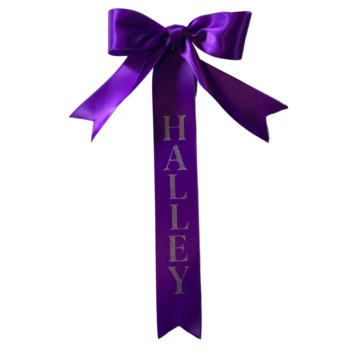 Purple custom tail bow with the name 'Halley' on a white background