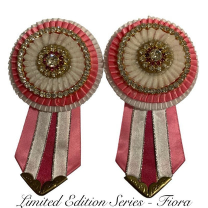 Two removable with pink and white design on a white background