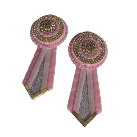 Pink removable rosettes - luminara on a white background