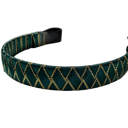 Green and gold trim ribbon browband on a white background