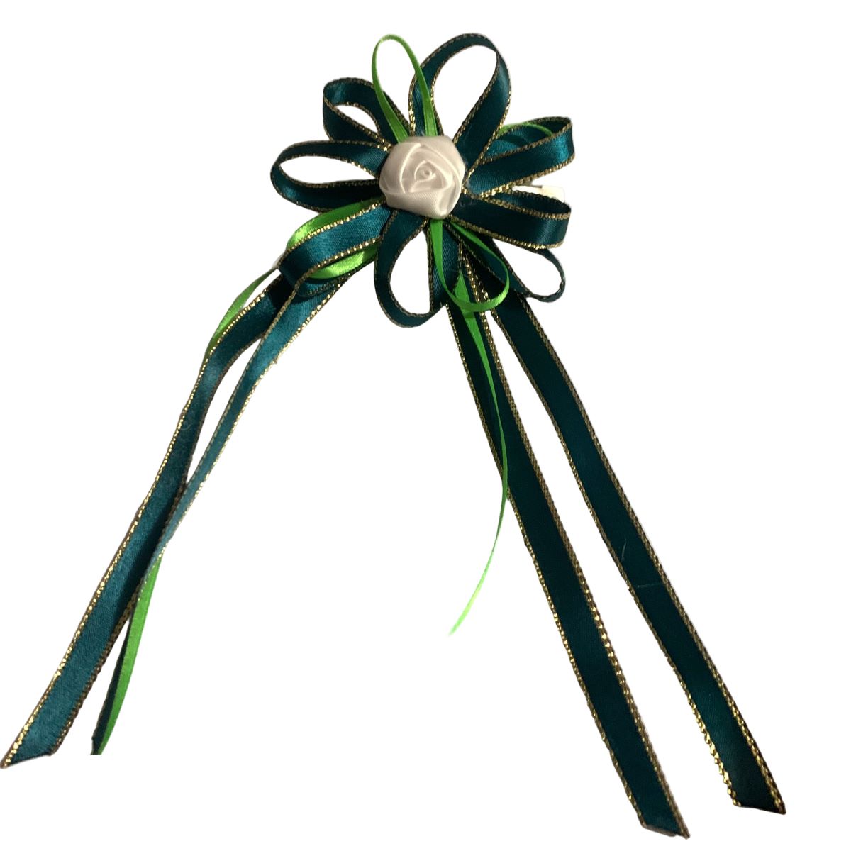 Decorative bow with green ribbons and a white center on a white background