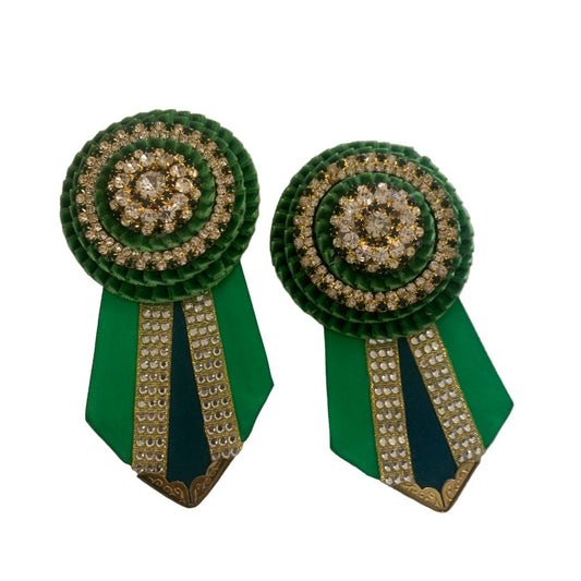 Green removable rosettes with decorative elements made by L'Equino Essentials on a white background
