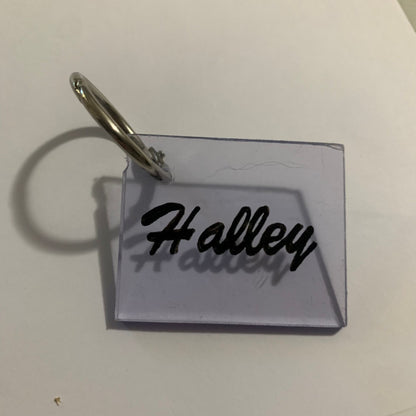 Clear keychain with 'Halley' engraved on a white background