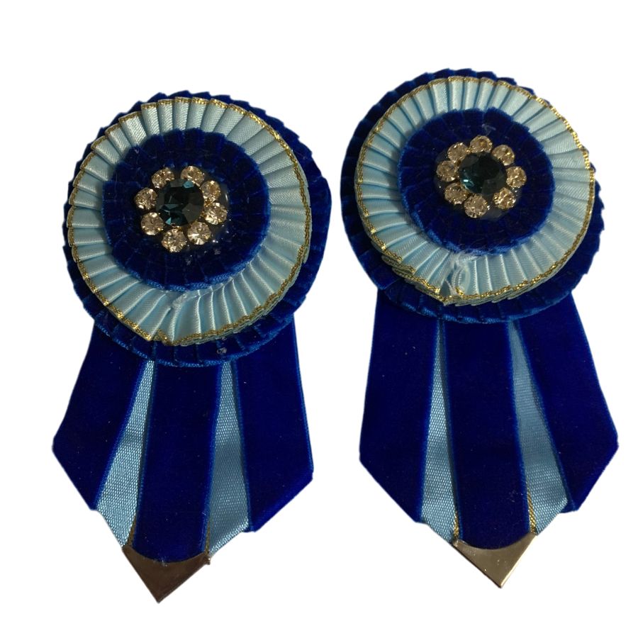 Royal blue and light blue removable rosettes on a white background