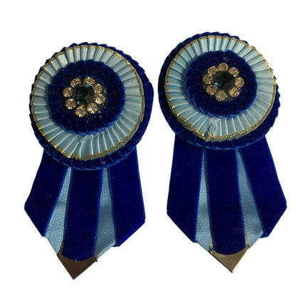 Royal blue and light blue removable rosettes on a white background