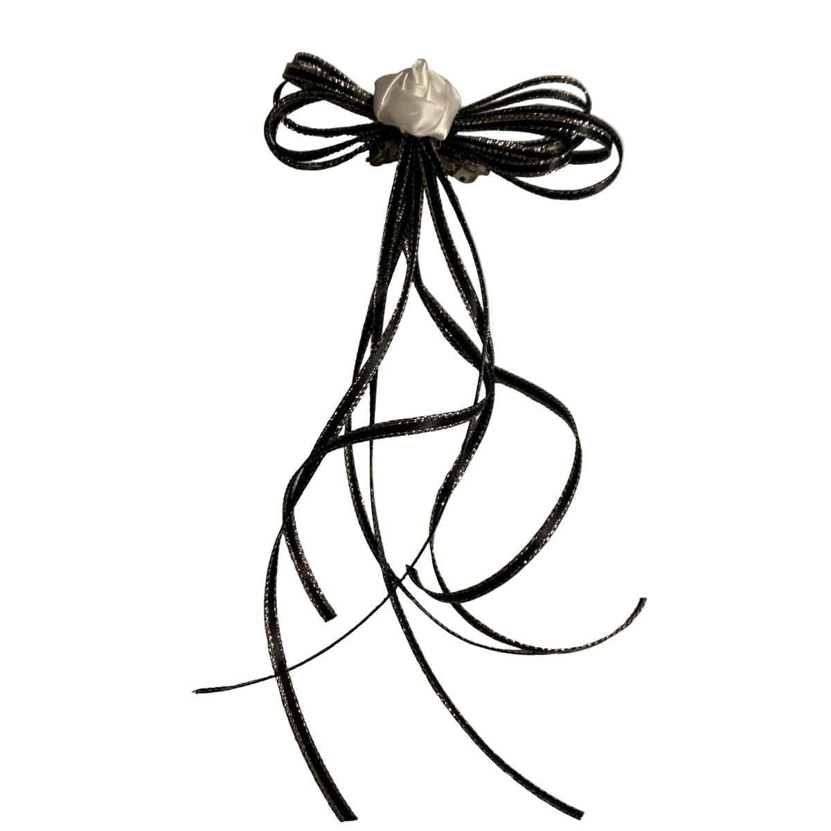 Black hair bow with a white flower on a white background