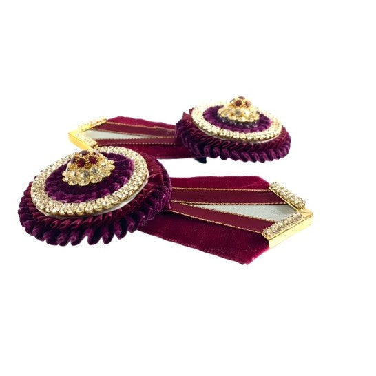 Side view of the burgundy removable rosettes - luminara on a white background