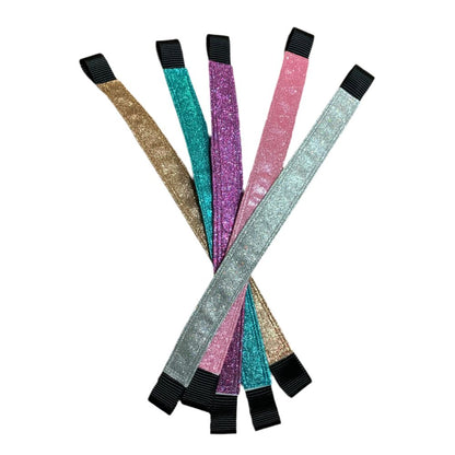 Set of glittery browbands with black ends on a white background