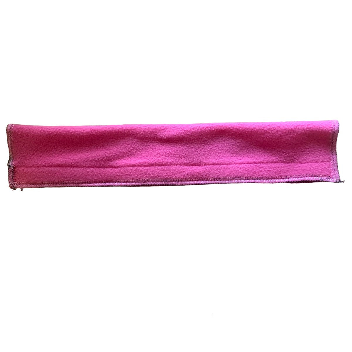 Pink fleece browband cover on a white background