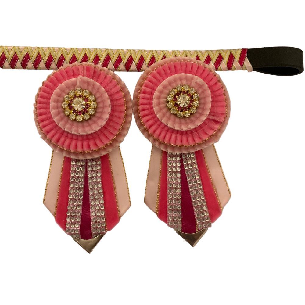 Decorative show browband with pink rosettes and embellishments on a white background