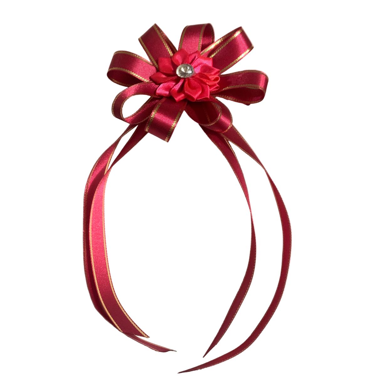 Dark pink equestrian long tailed hair bow on a white background