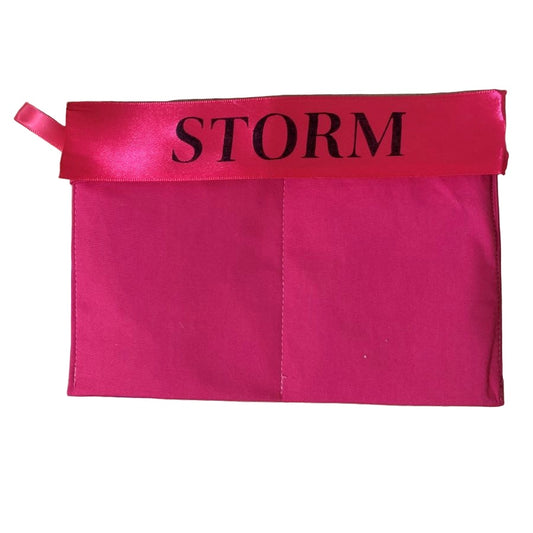 Pink pouch with 'STORM' text on a white background