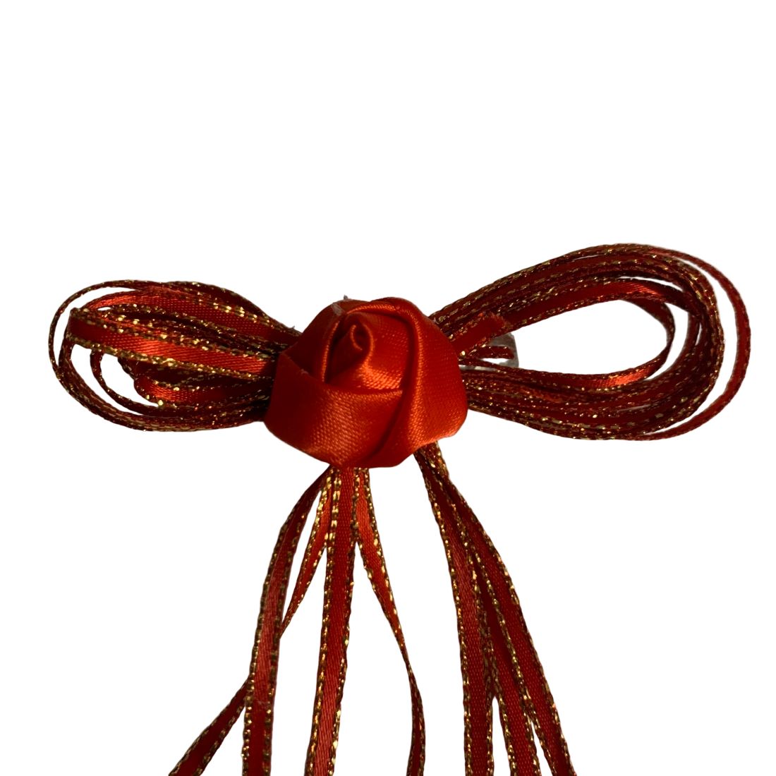 Shiny red bow on a white background