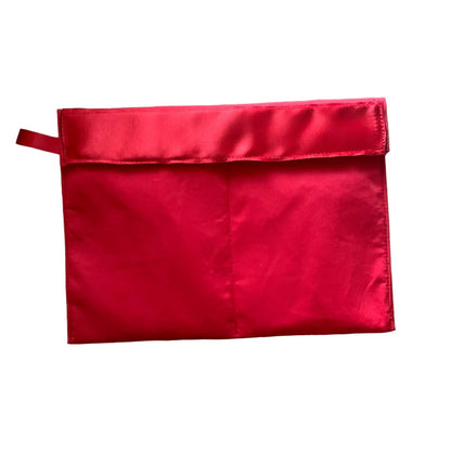 Red rosette storage cover on a white background