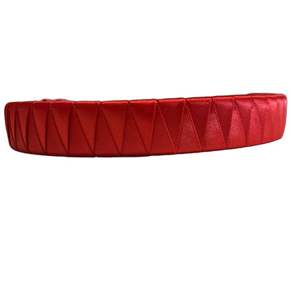 Red satin ribbon horse browband on a white background