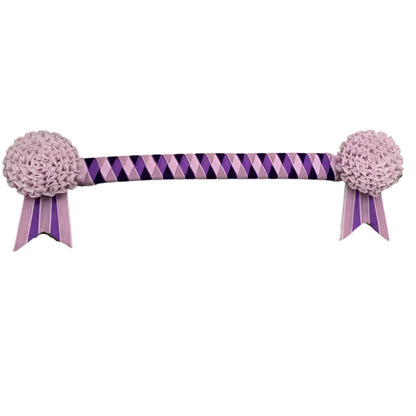 Purple and pink ribbon browband with decorative carnation rosettes on a white background