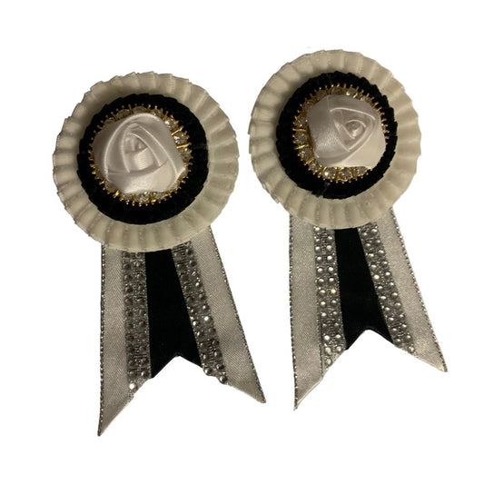 White removable rosettes for show browbands on a white background
