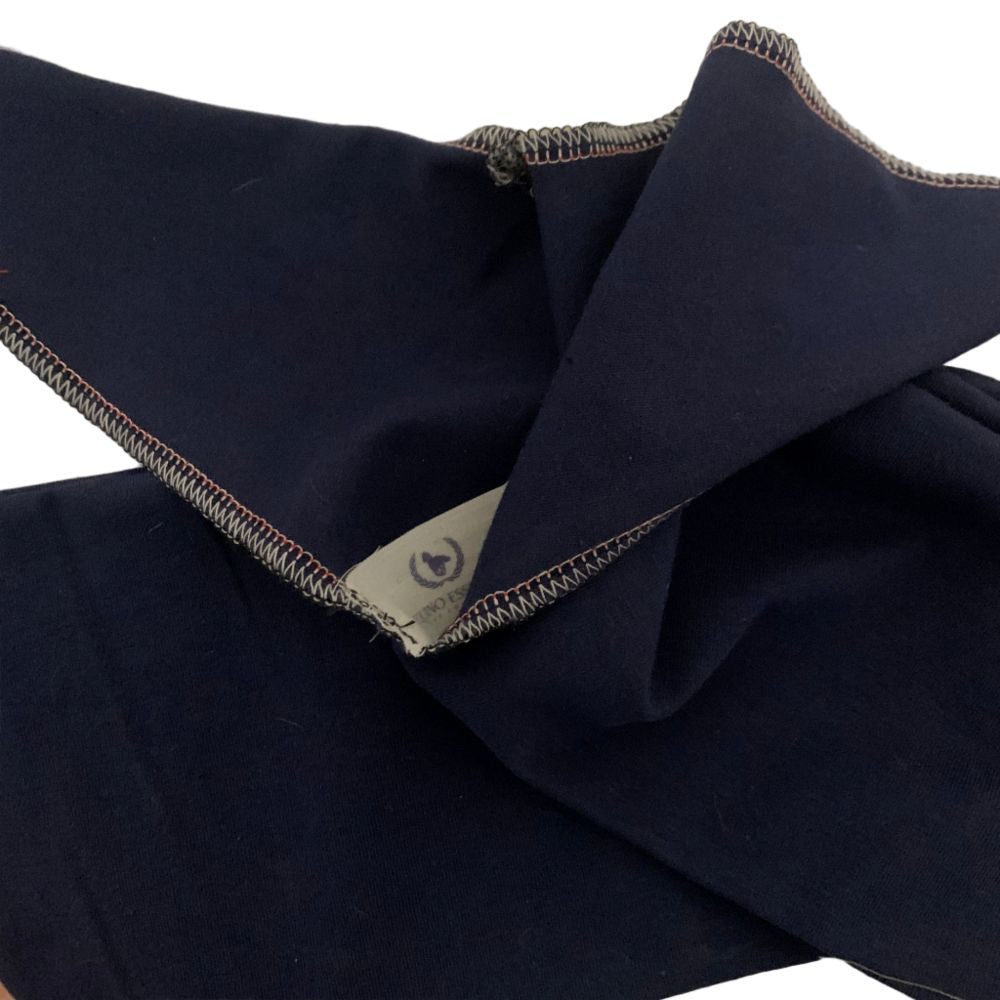 Navy blue tail bag with a brand label on a white background